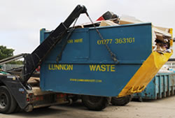 Skip Hire Chigwell full skip being unloaded