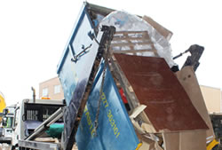 Skip Hire Chigwell unloading a skip at the transfer station