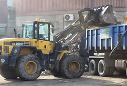 Skip Hire Chigwell loading a lorry